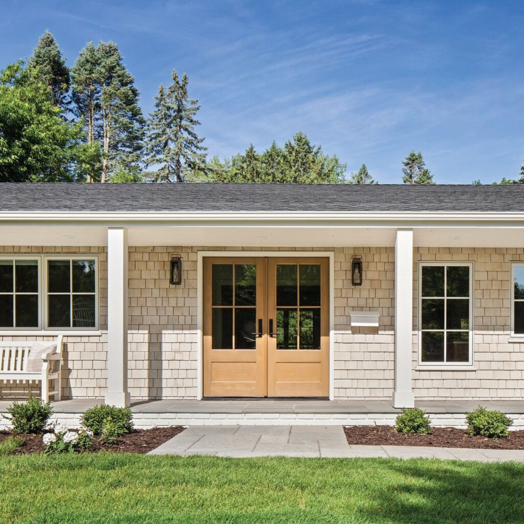 wooden entry doors at the front of a home